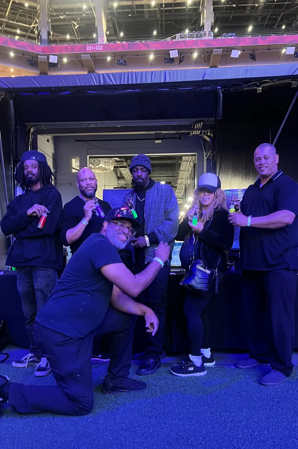 3JS Airbrushing team at field level inside Mercedes-Benz Stadium