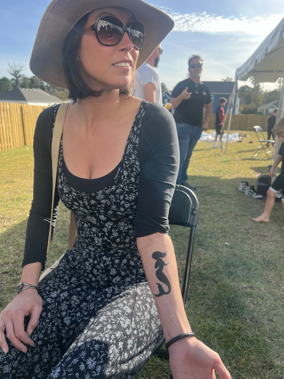 Guest showing a temporary arm tattoo in Austin, Texas