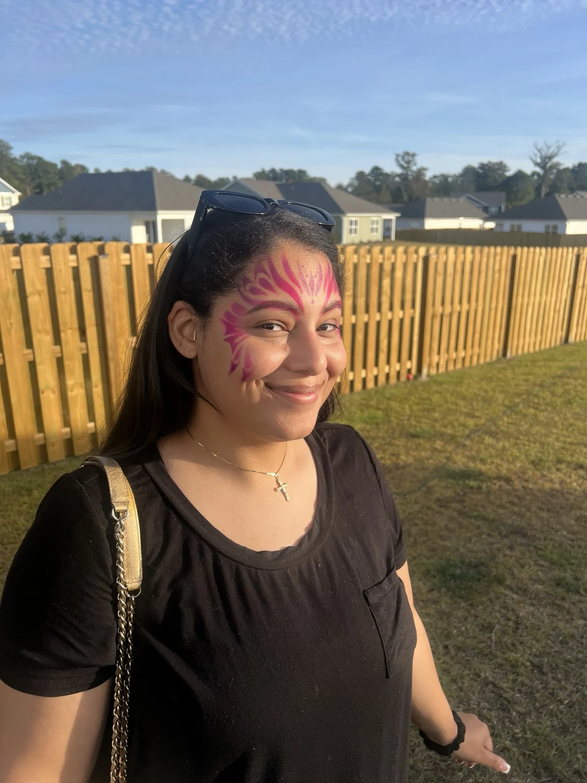 Guest showing colorful face art at the Austin event in Austin, Texas