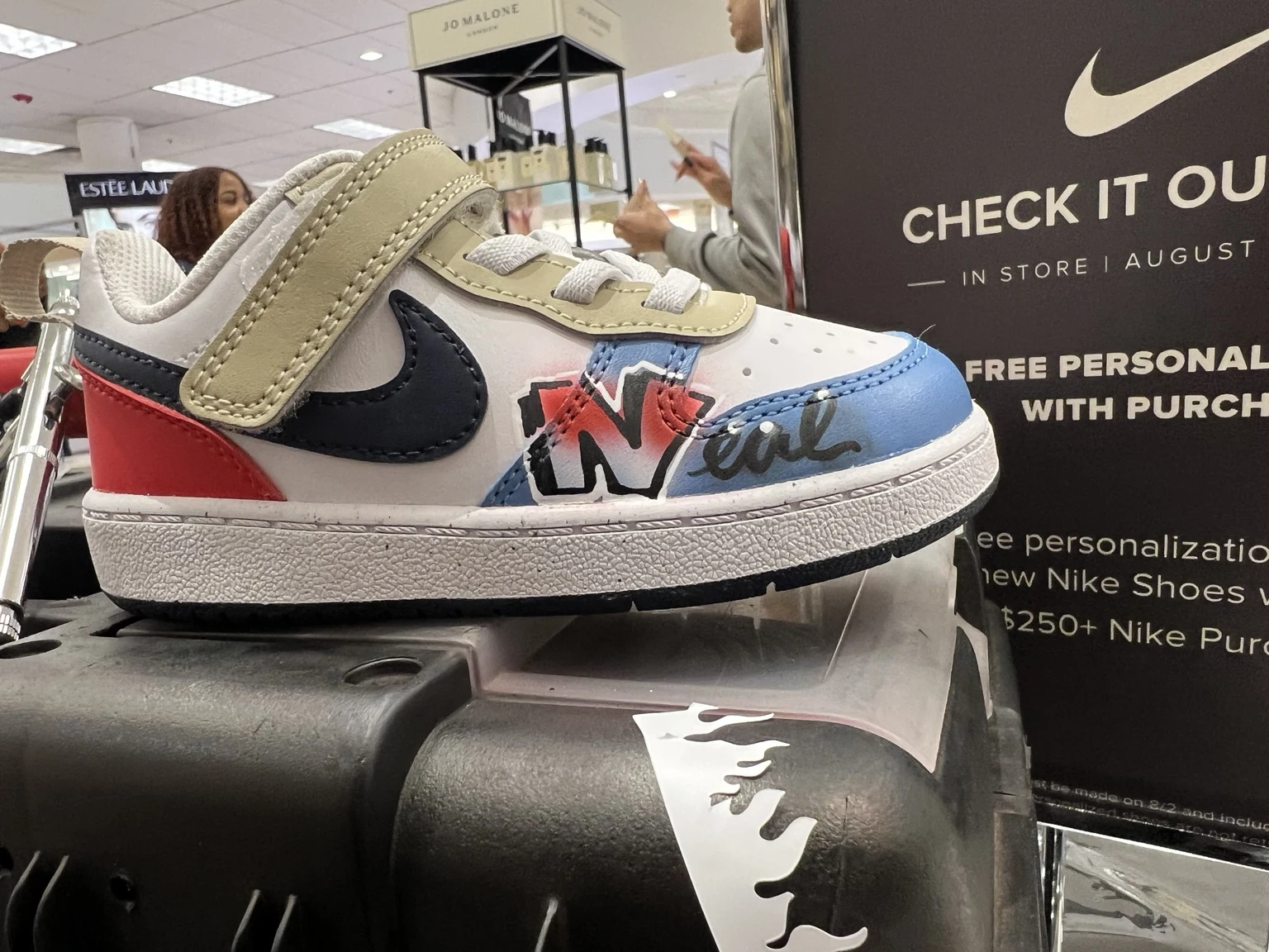 Personalized Nike shoe at the Belk airbrushing event