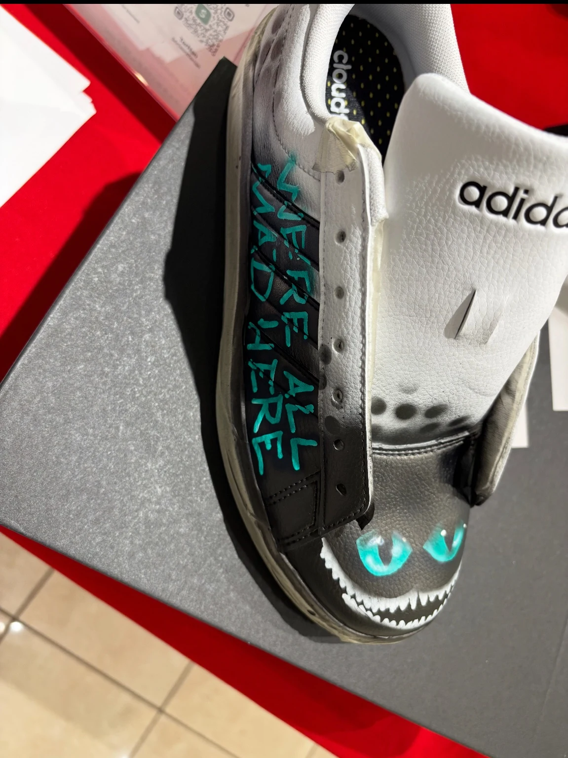 Close-up of custom artwork on a sneaker