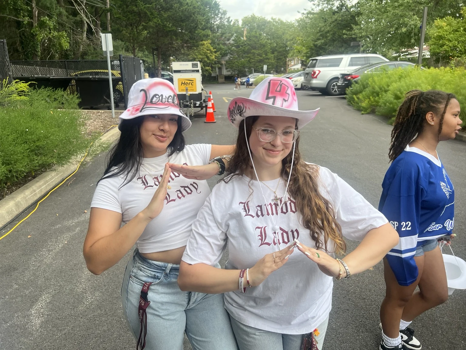 Delaware State University student with a personalized airbrushed hat — event photo 2