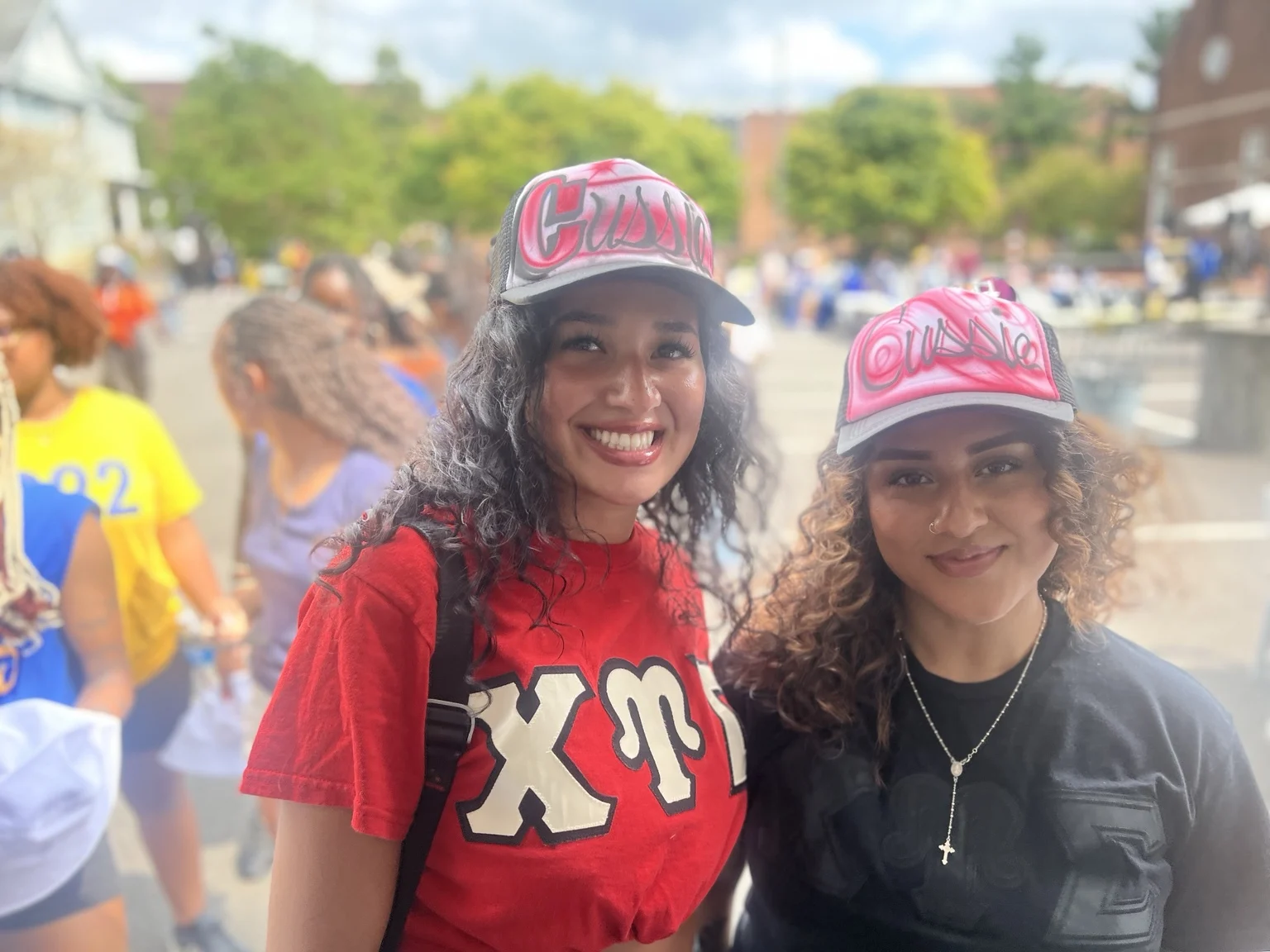 Delaware State University student with a personalized airbrushed hat — event photo 4