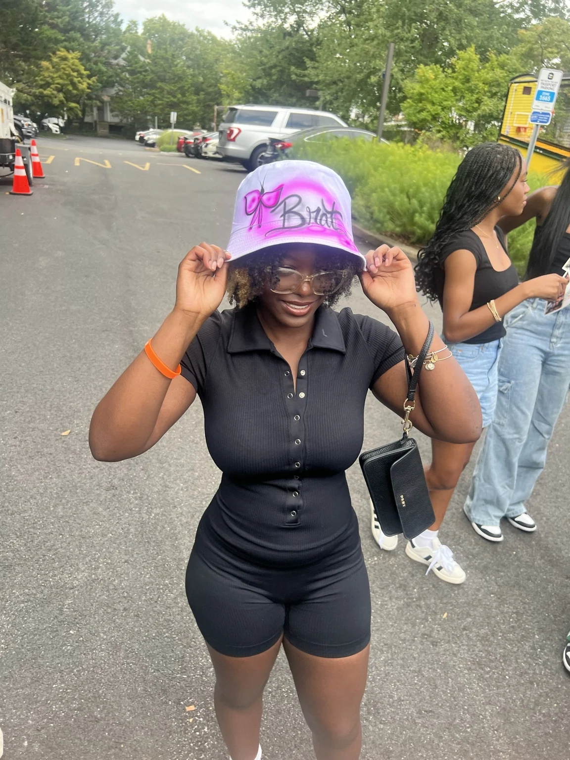 Delaware State University student with a personalized airbrushed hat — event photo 7