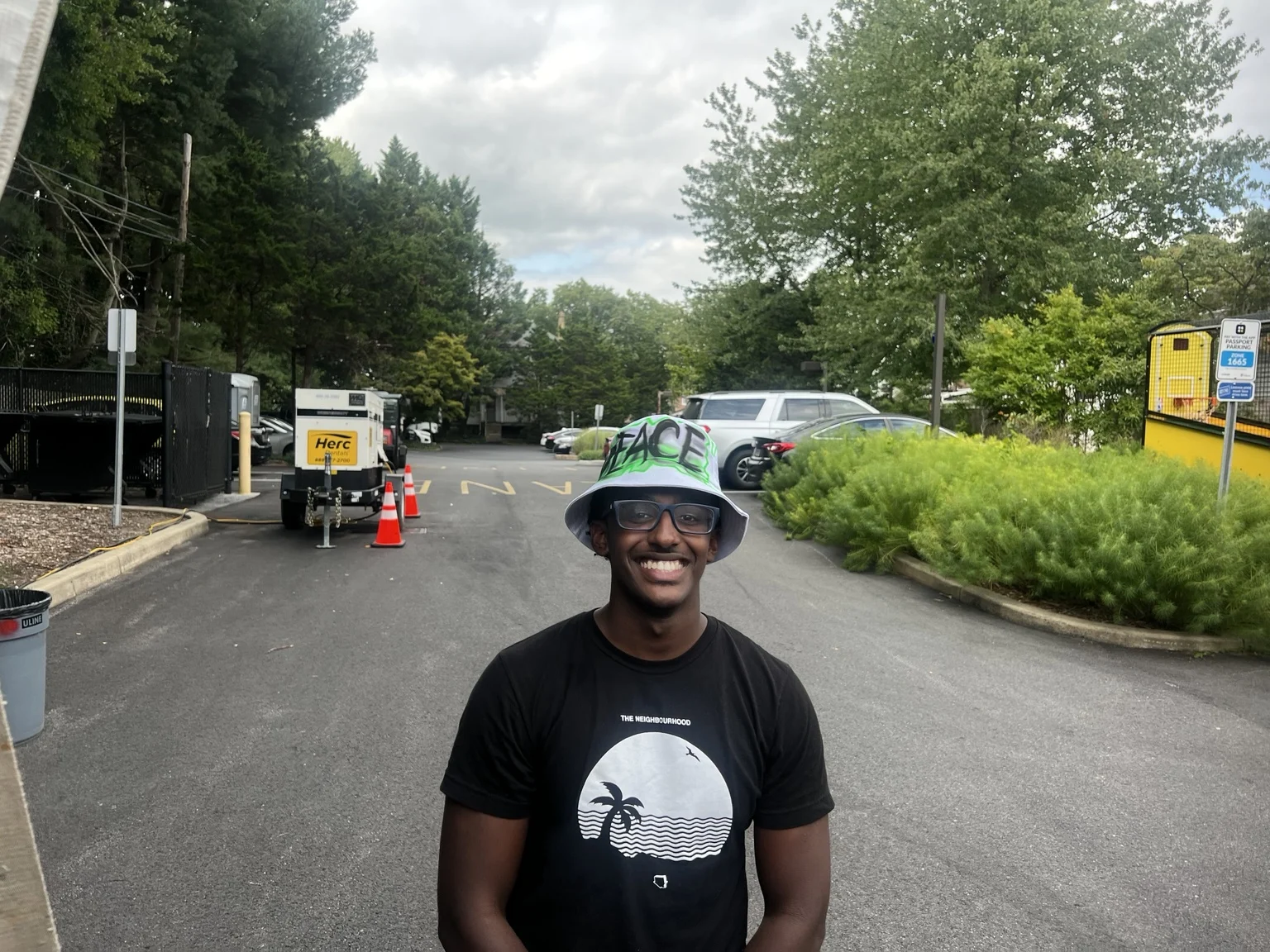 Delaware State University student with a personalized airbrushed hat — event photo 9