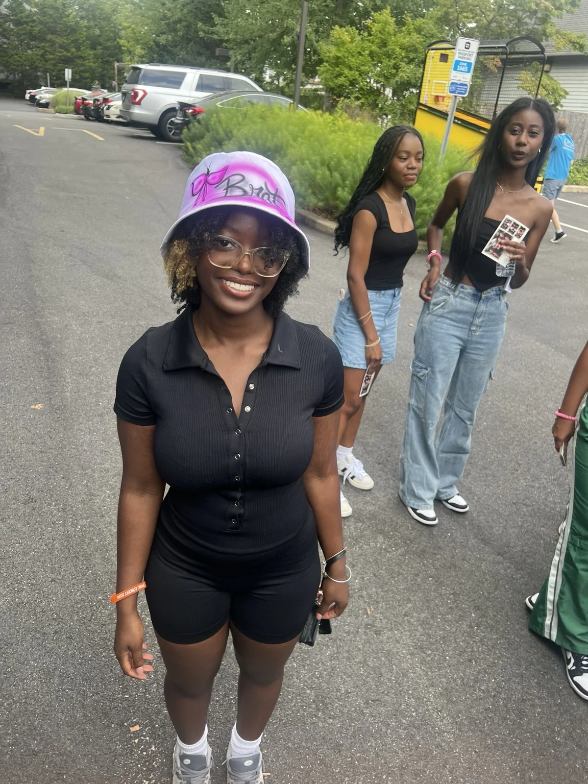 Delaware State University student with a personalized airbrushed hat — event photo 10