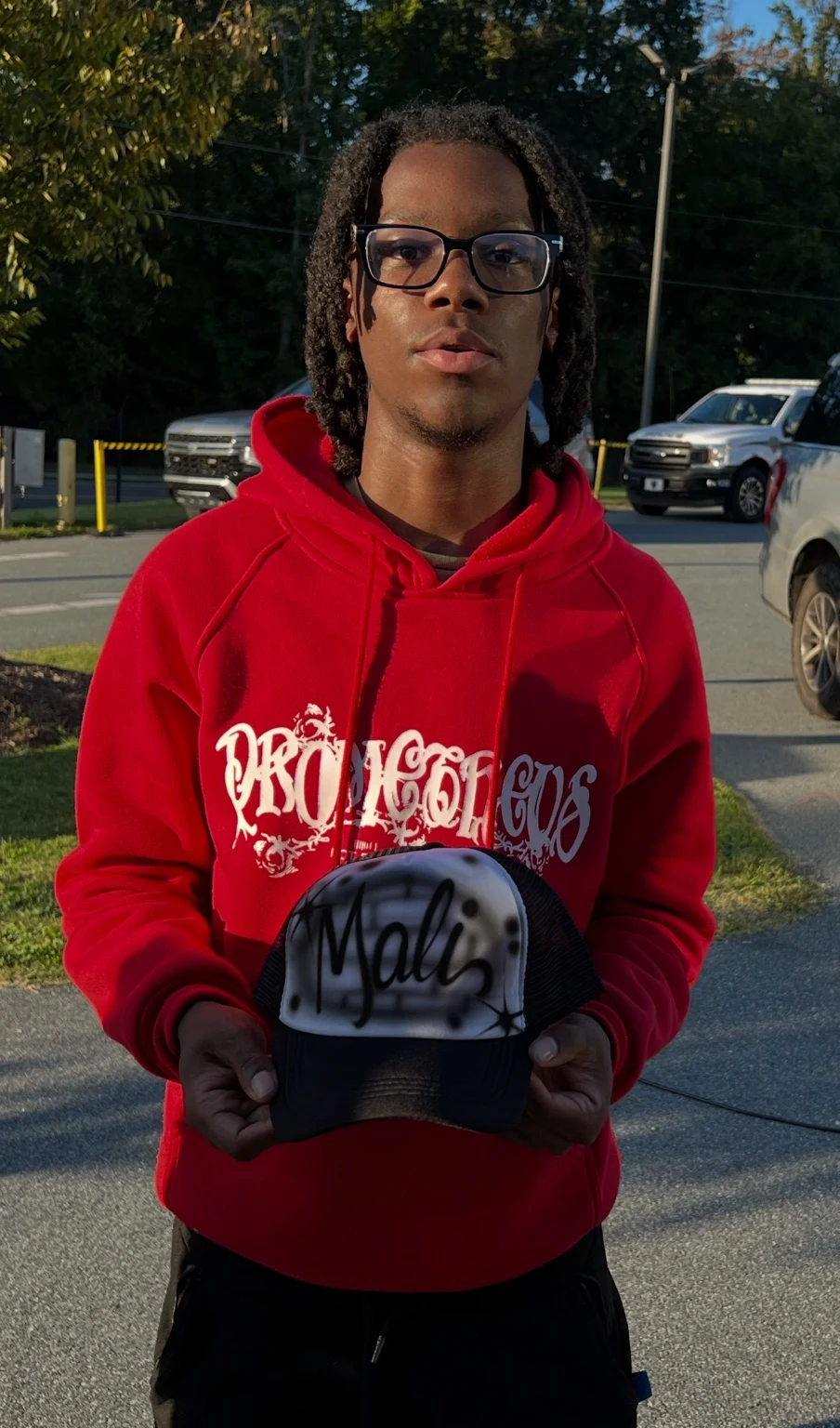 Florida A&M University student with a personalized airbrushed hat — event photo 2