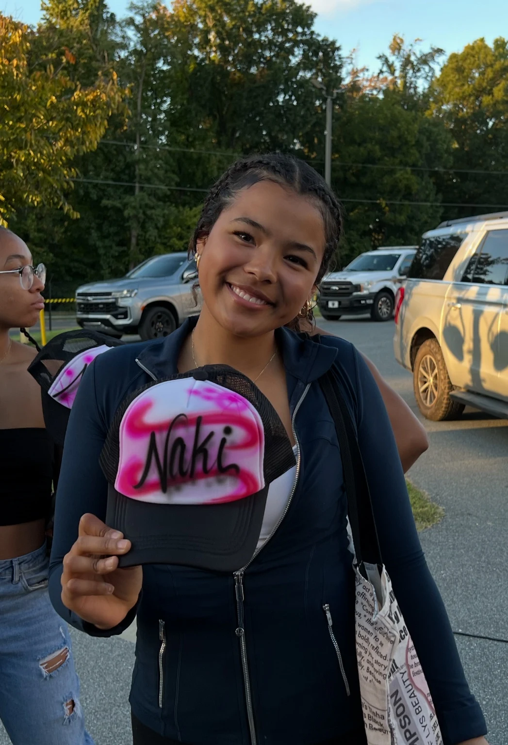 Florida A&M University student with a personalized airbrushed hat — event photo 4