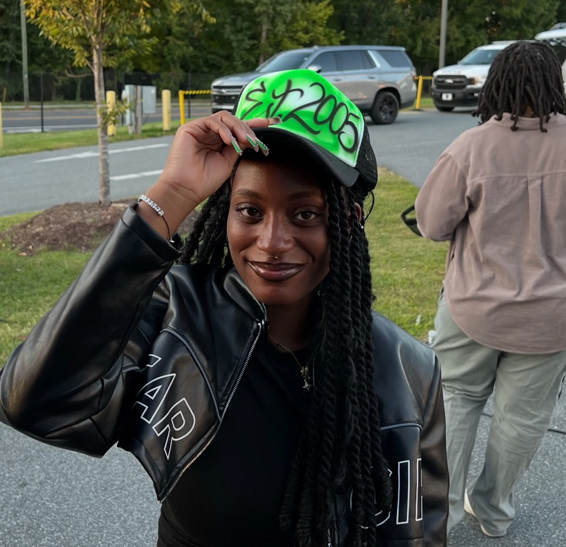 Florida A&M University student with a personalized airbrushed hat — event photo 5