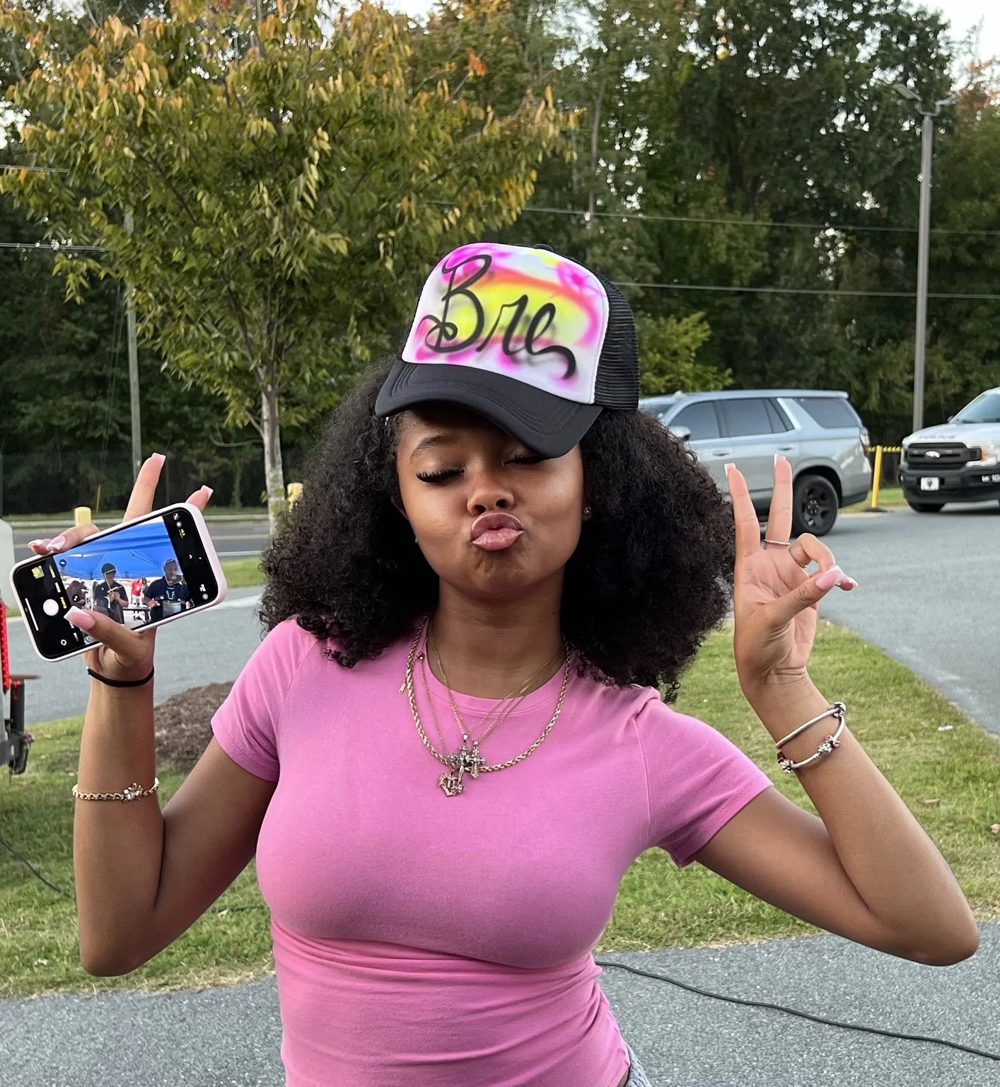 Florida A&M University student with a personalized airbrushed hat — event photo 6