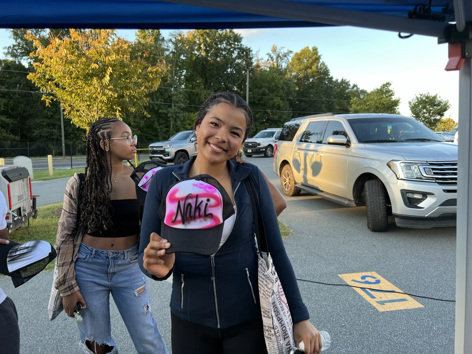 Florida A&M University student with a personalized airbrushed hat — event photo 8