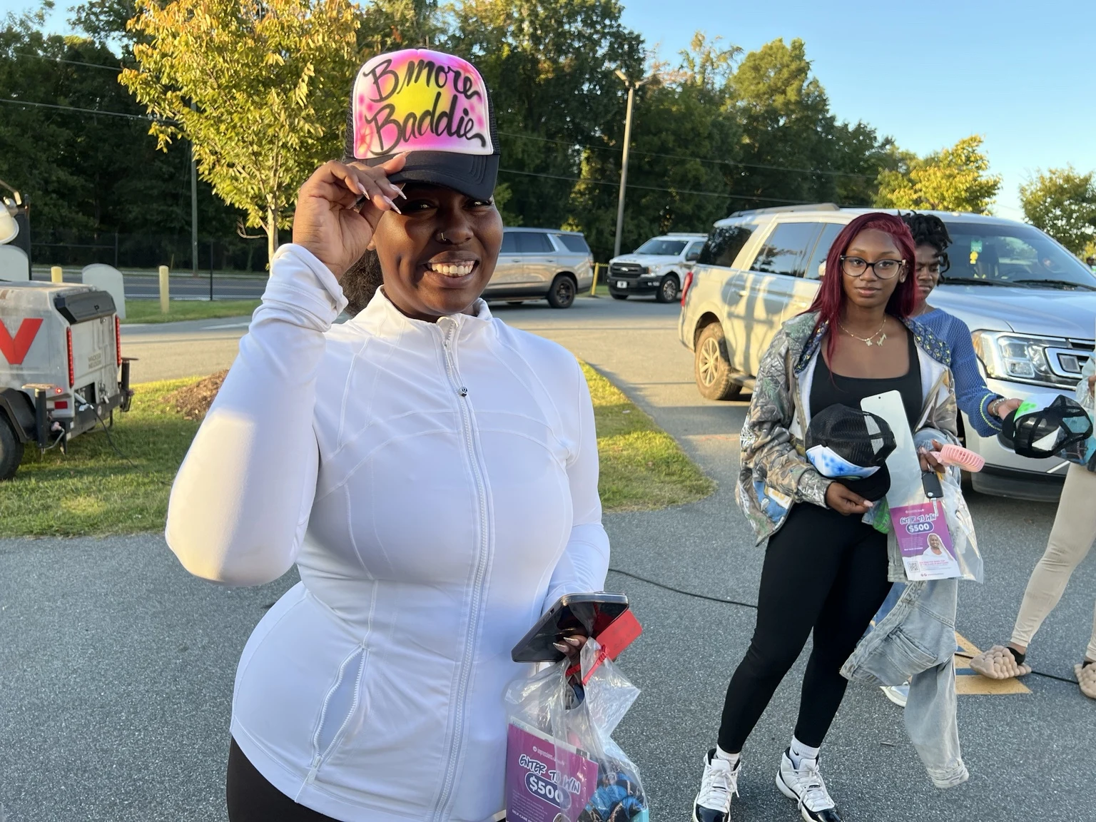Florida A&M University student with a personalized airbrushed hat — event photo 9
