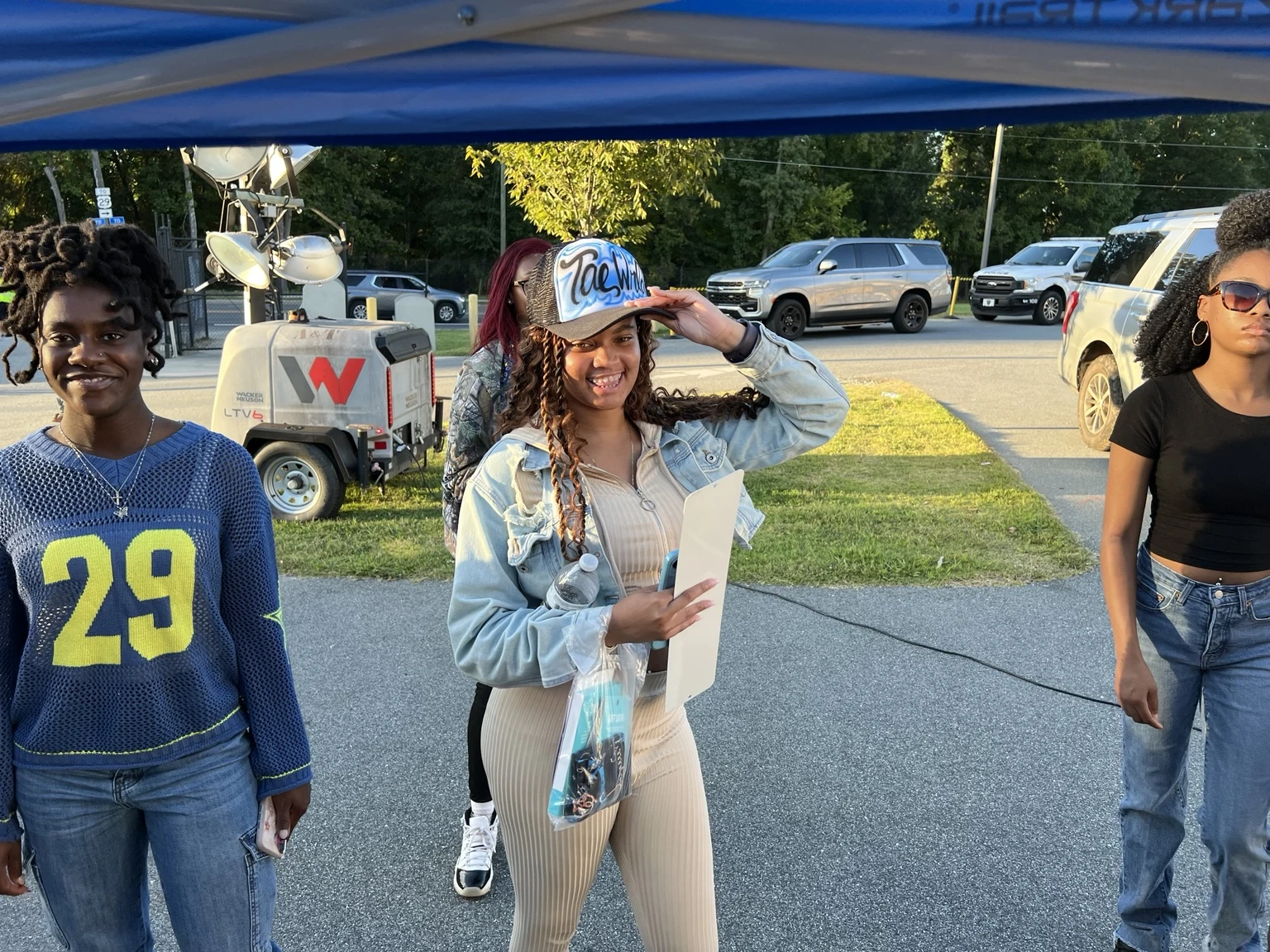 Florida A&M University student with a personalized airbrushed hat — event photo 10