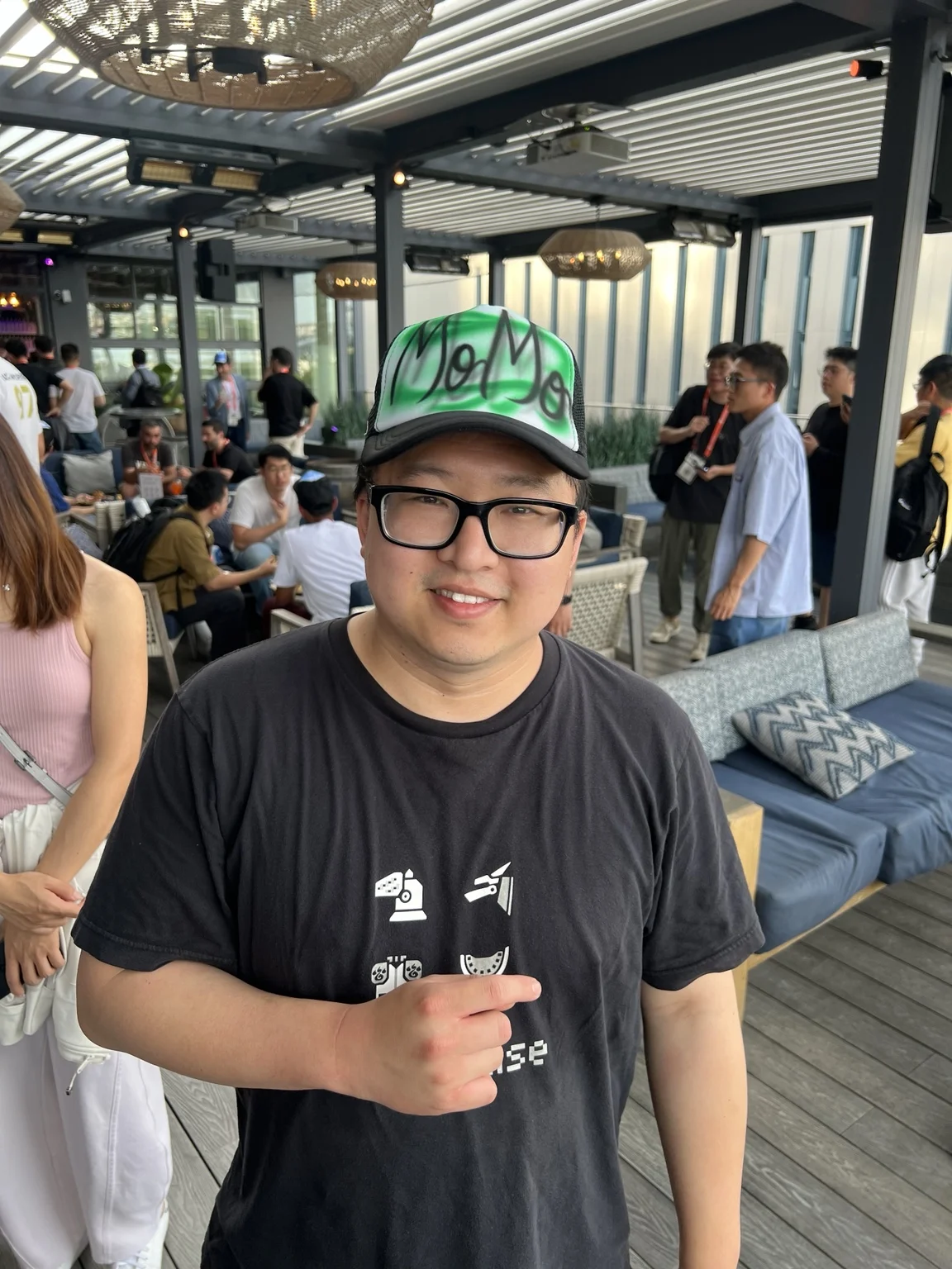 Guest wearing a green personalized airbrushed trucker hat in Nashville, Tennessee