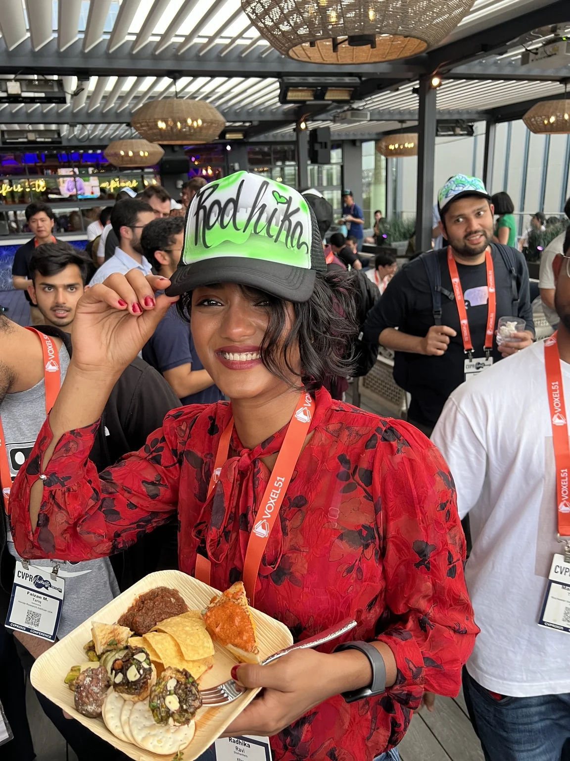 Guest wearing a green personalized hat at the corporate event in Nashville, Tennessee