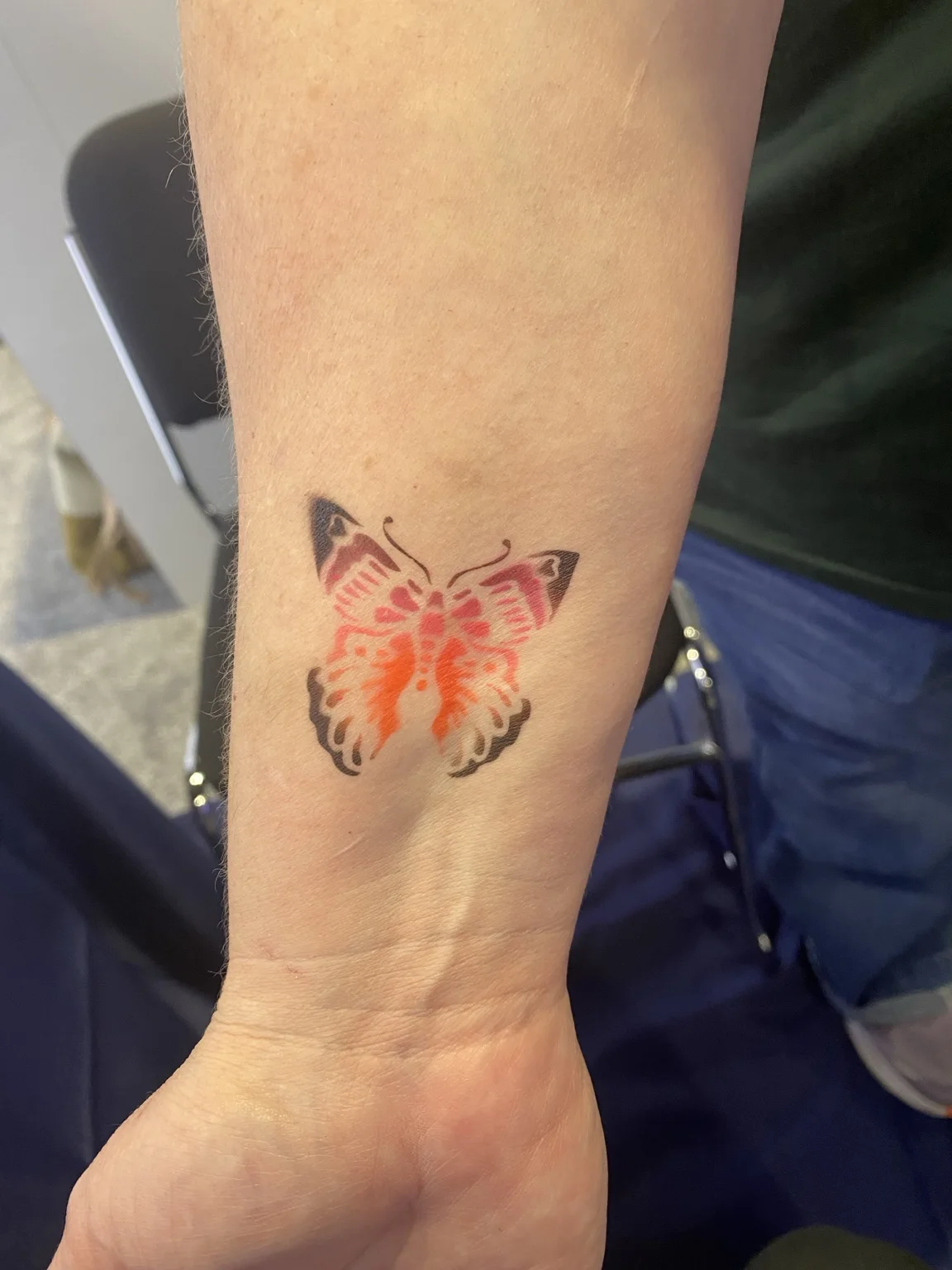 Butterfly temporary airbrush tattoo at the Arista corporate event in Savannah, Georgia
