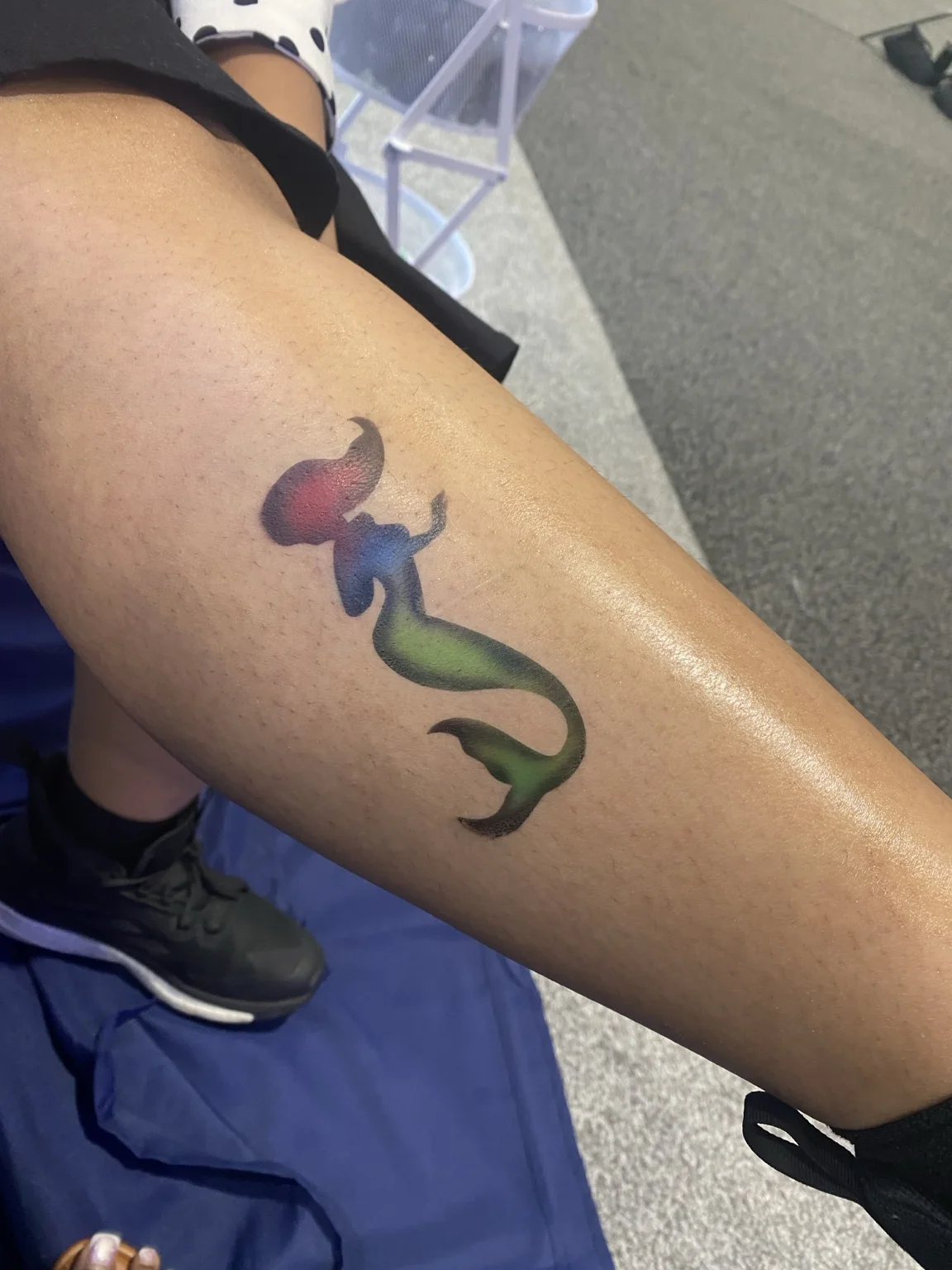 Colorful mermaid temporary airbrush tattoo at the Arista corporate event in Savannah, Georgia