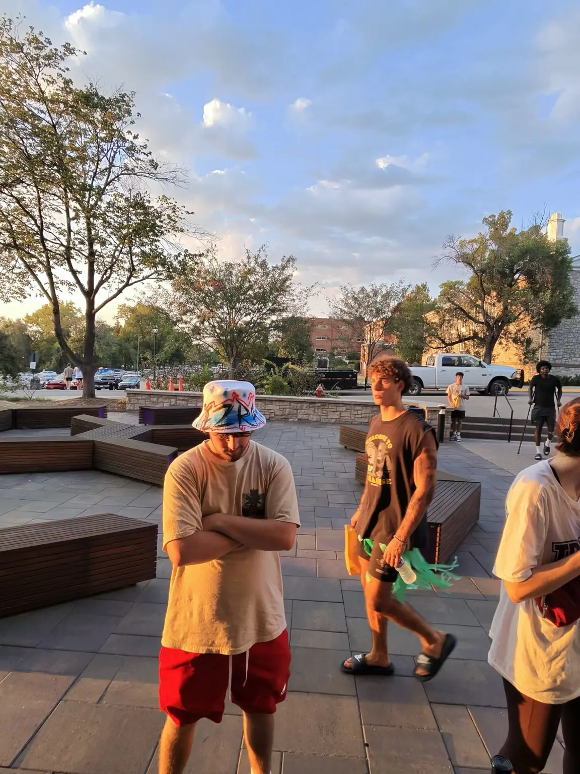Trevecca Nazarene student wearing a colorful custom airbrushed bucket hat