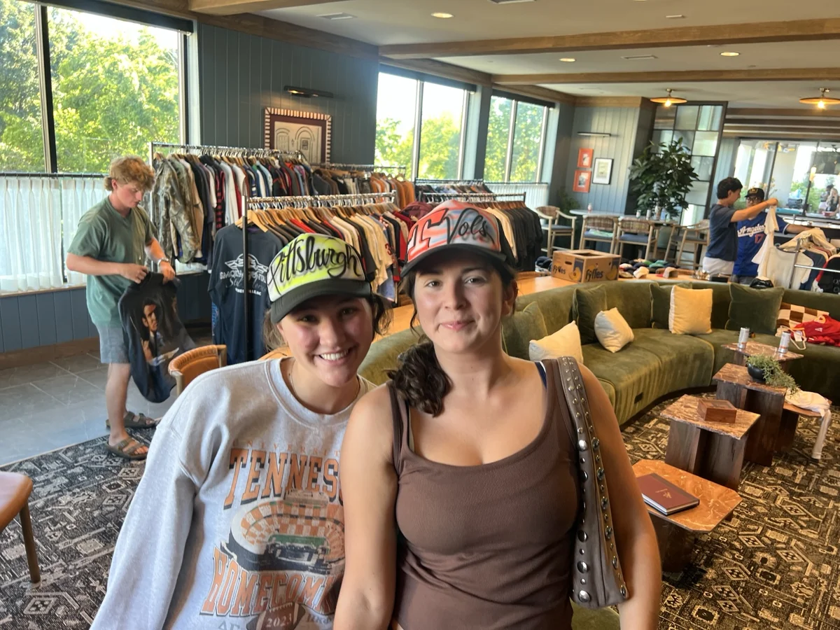 Guests wearing Pittsburgh and Tennessee inspired airbrush hats at the University of Tennessee event.