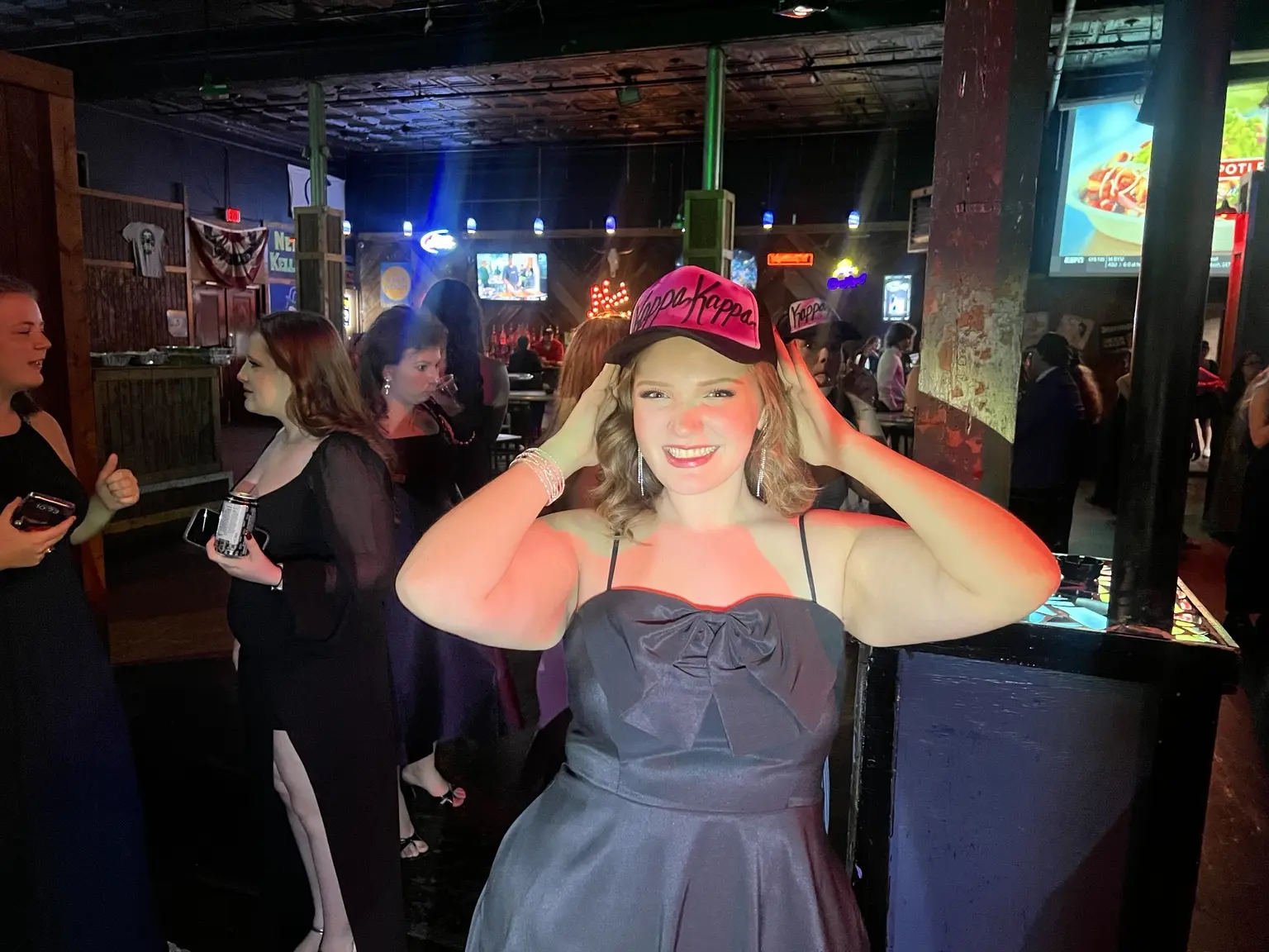 Guest wearing a finished custom trucker hat at the University of South Carolina event