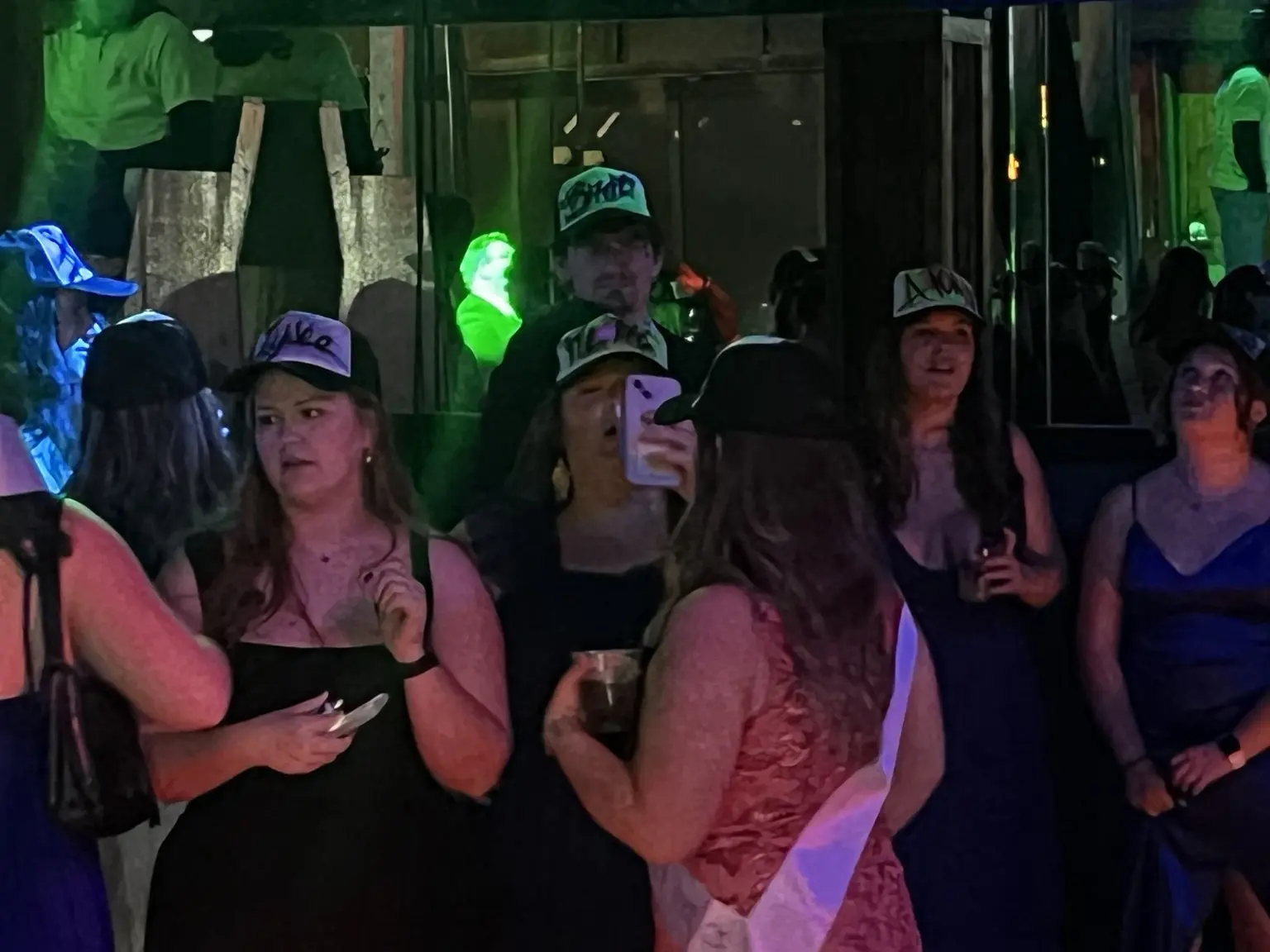 Students wearing personalized airbrushed hats at the University of South Carolina